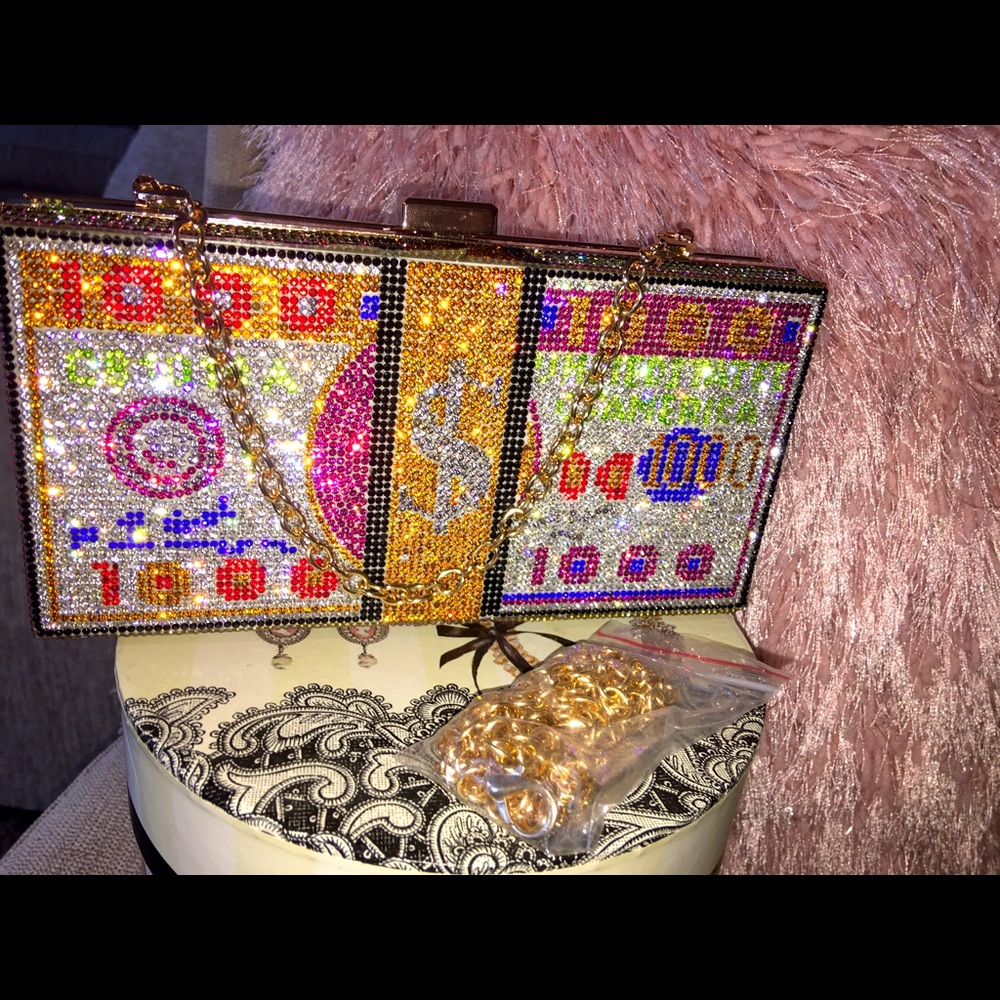 Glam $$ themed purse, 8”x4”. Fits phone, keys, lip gloss, cash or credit card.